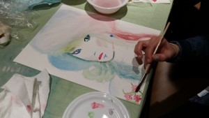 Experimenting with watercolor at an Infused Arts workshop